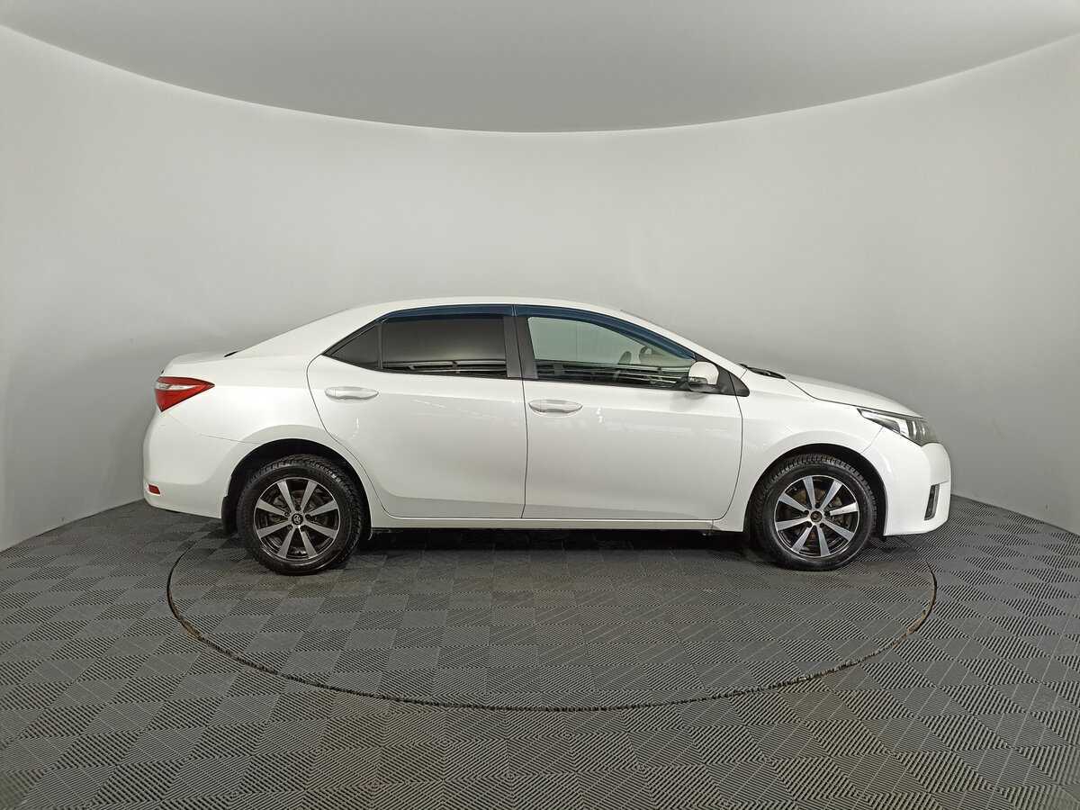 Toyota Corolla 2013 года с пробегом. Фото: #3