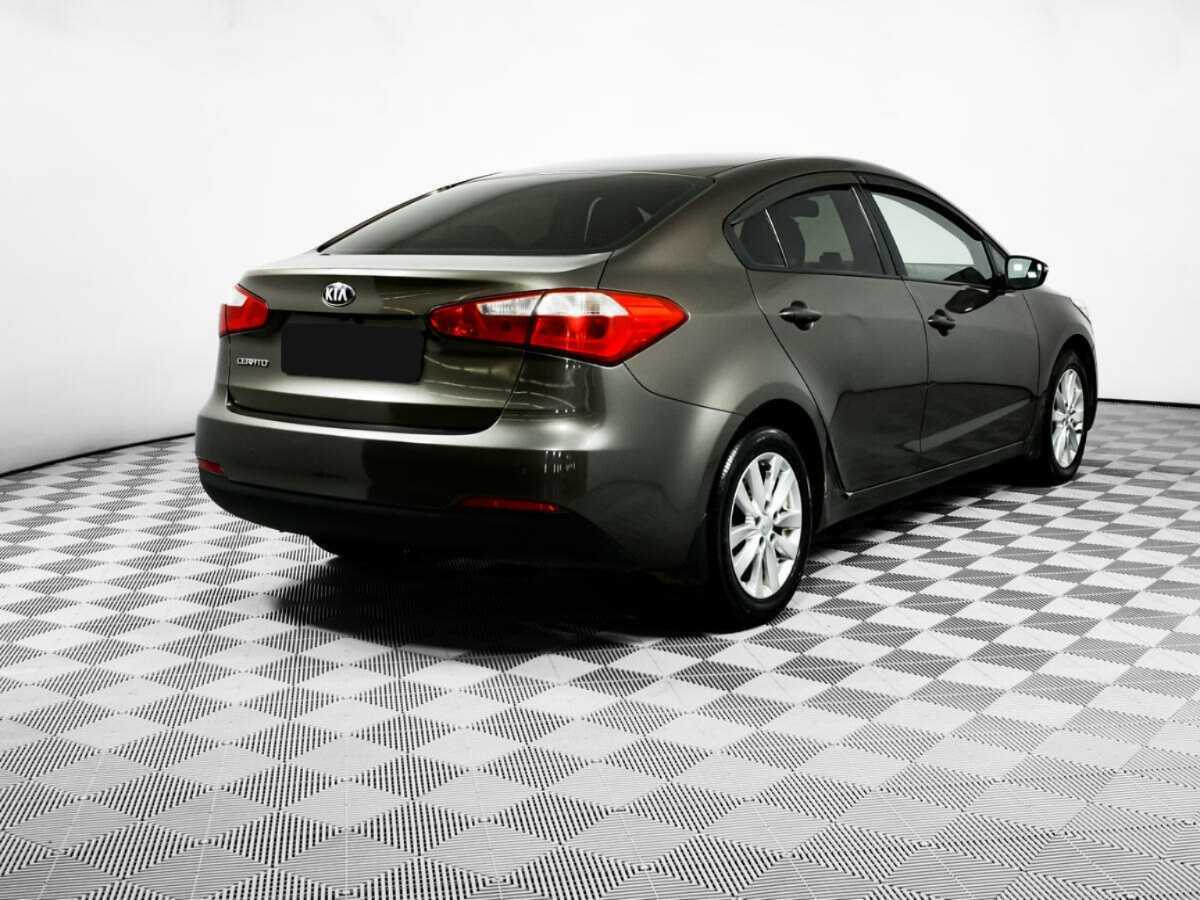 Kia Cerato 2014 года с пробегом. Фото: #4