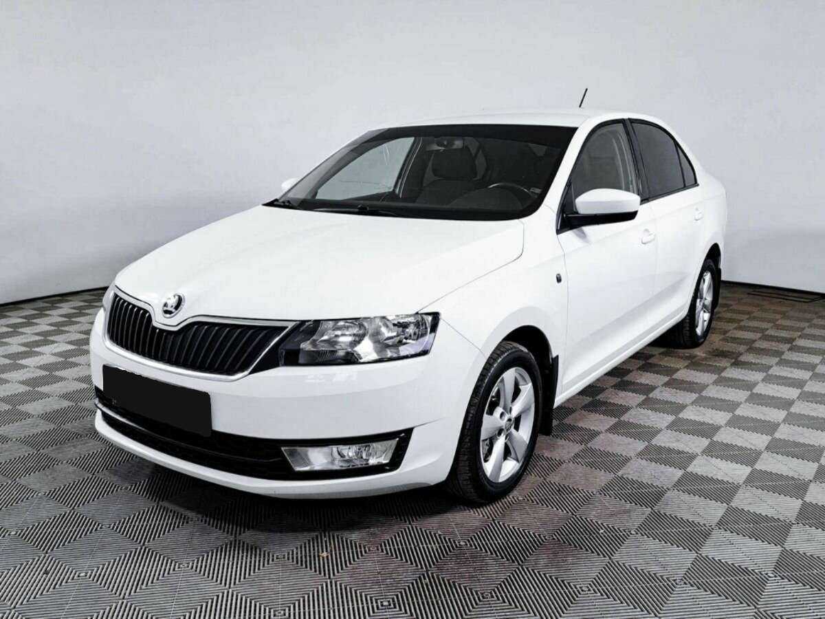 Skoda Rapid 2014 года с пробегом. Посмотреть фото