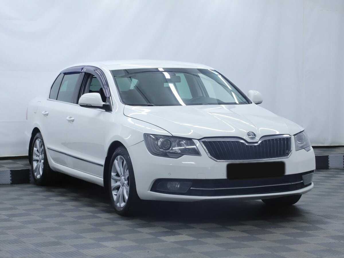 Skoda Superb 2013 года с пробегом. Фото: #2