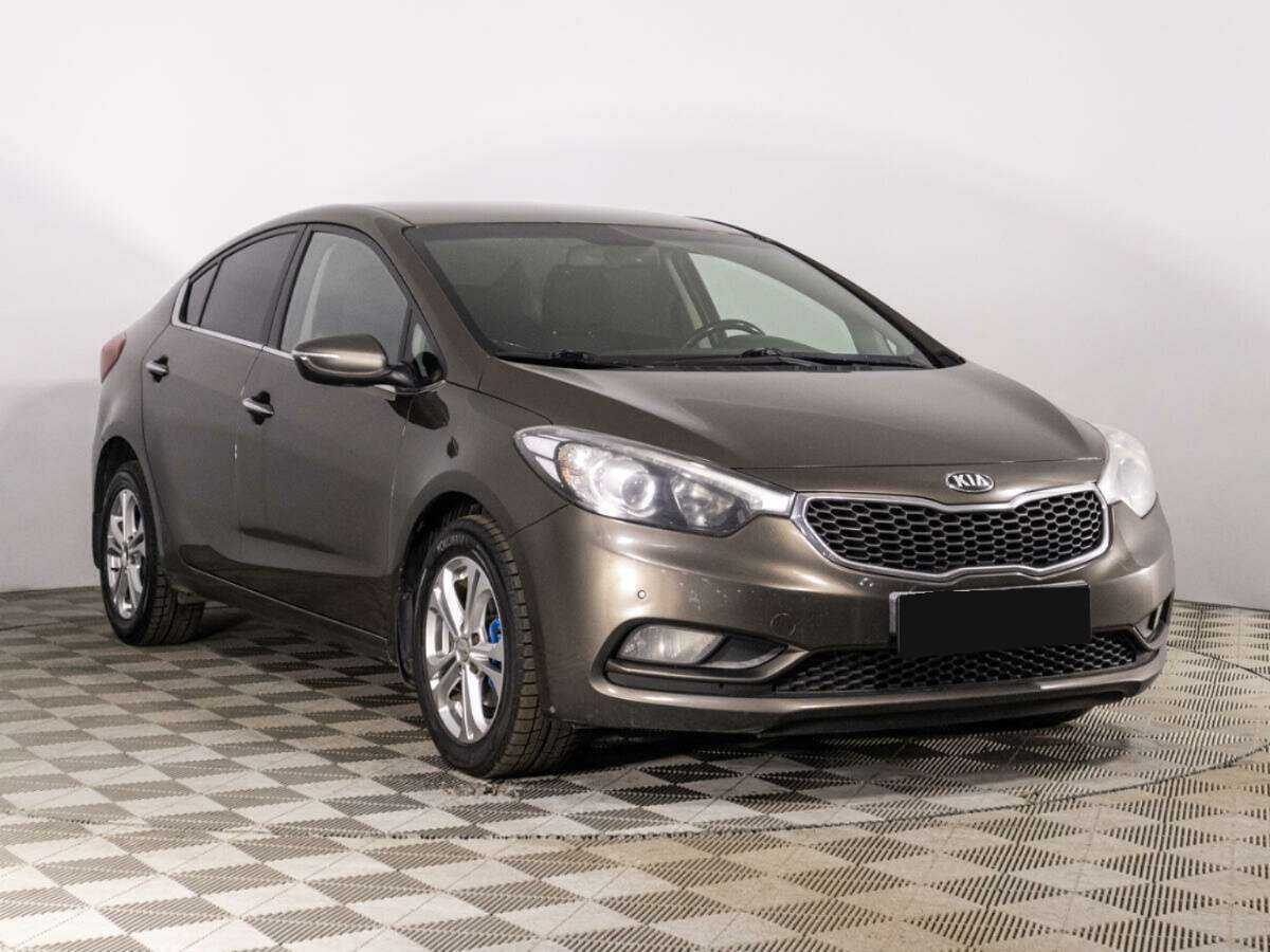 Kia Cerato 2014 года с пробегом. Фото: #2