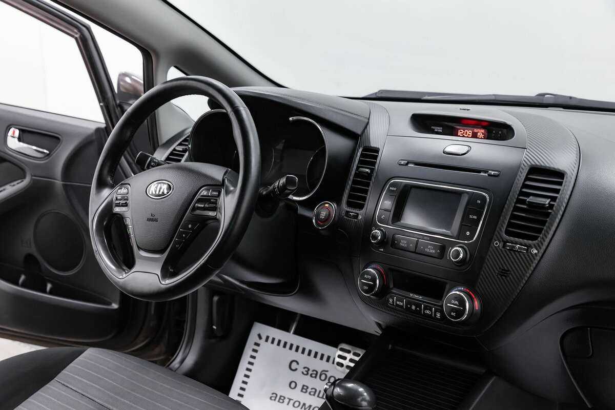 Kia Cerato 2013 года с пробегом. Фото: #9