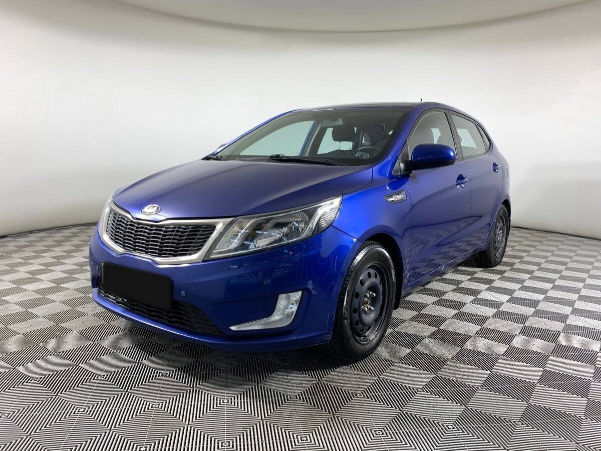 Kia Rio 2013 года с пробегом. Посмотреть фото