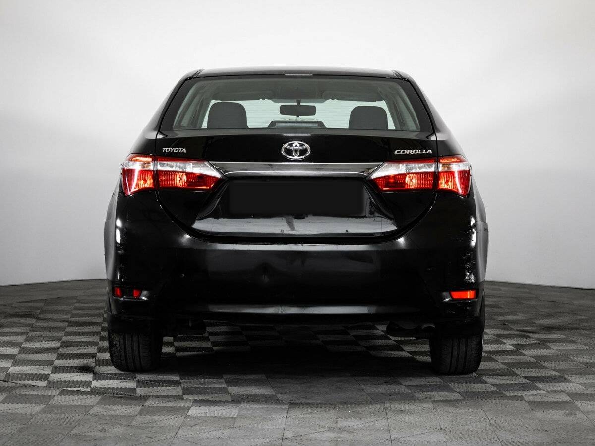 Toyota Corolla 2014 года с пробегом. Фото: #3