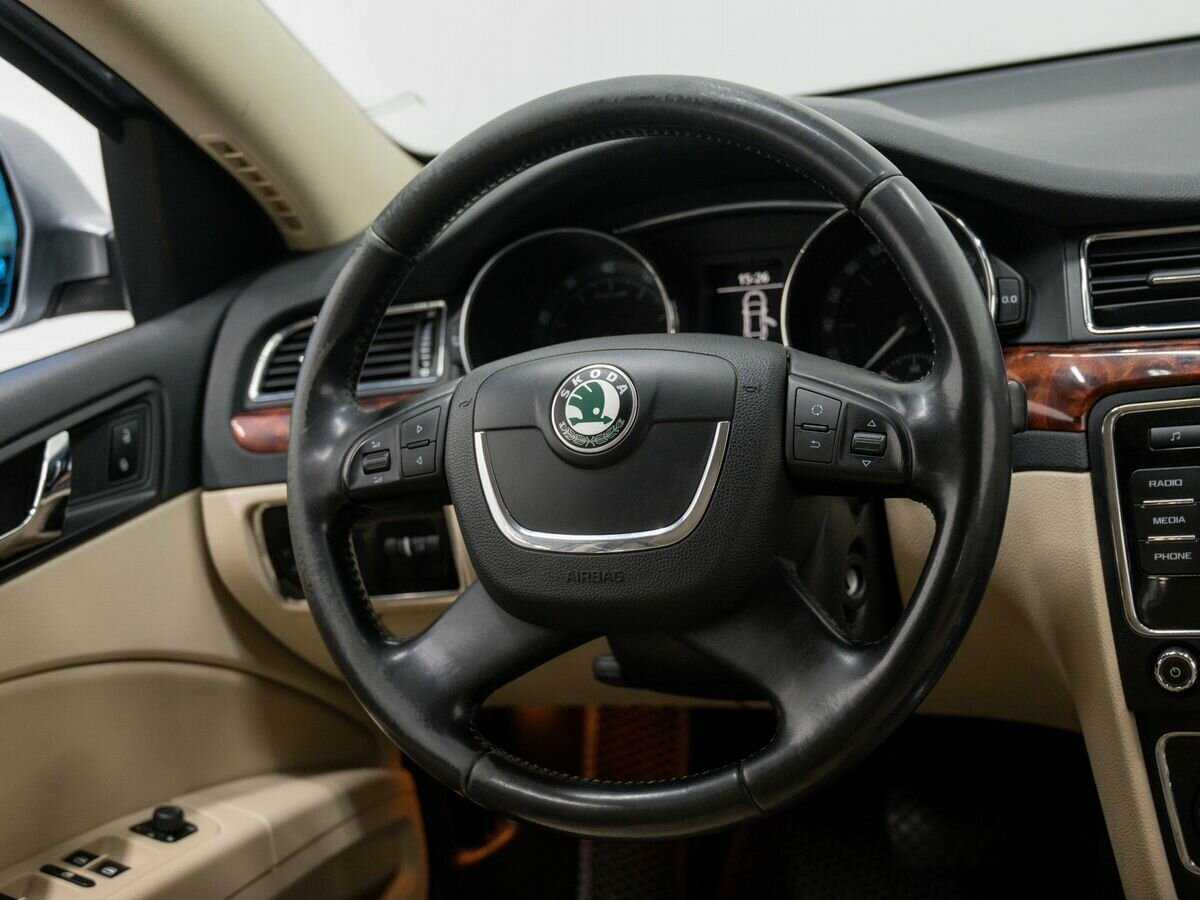 Skoda Superb 2012 года с пробегом. Фото: #11
