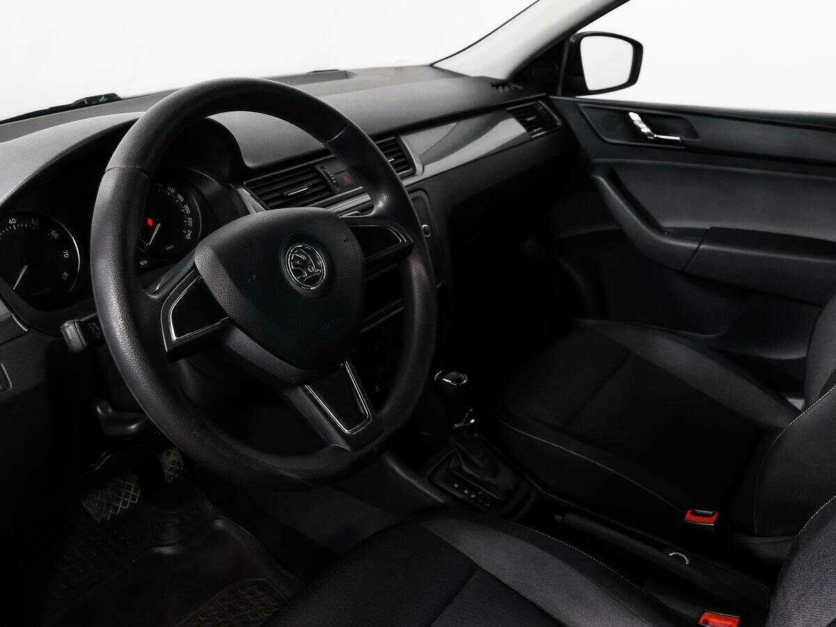 Skoda Rapid 2014 года с пробегом. Фото: #6