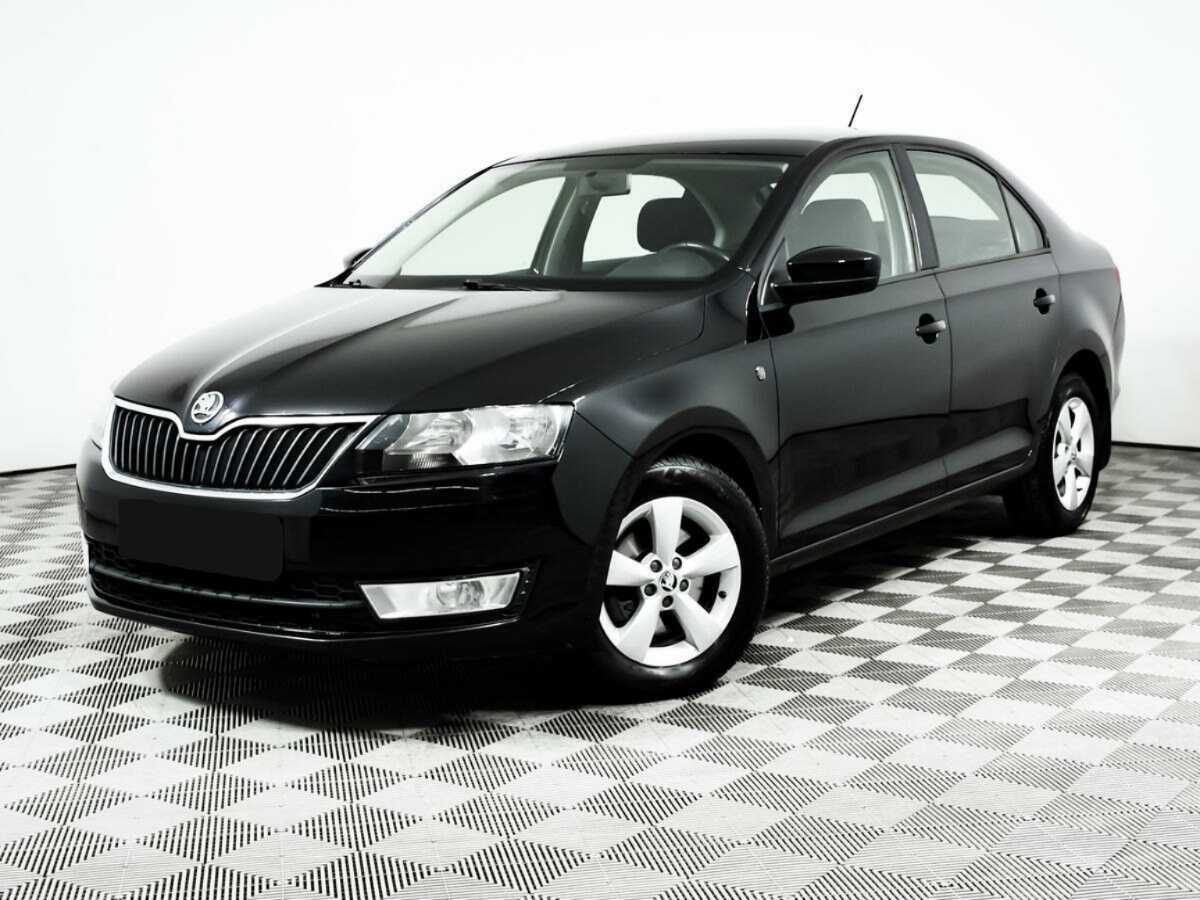 Skoda Rapid 2014 года с пробегом. Посмотреть фото