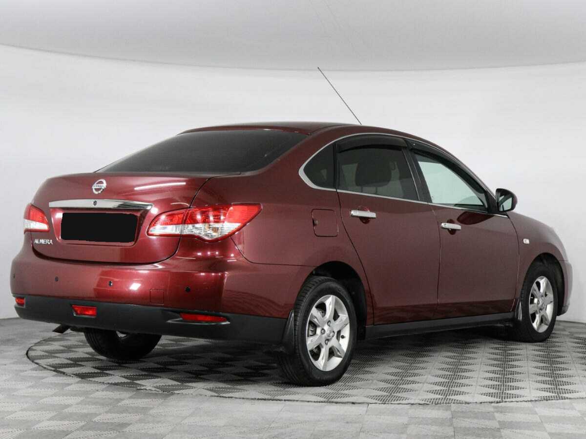 Nissan Almera 2013 года с пробегом. Фото: #3