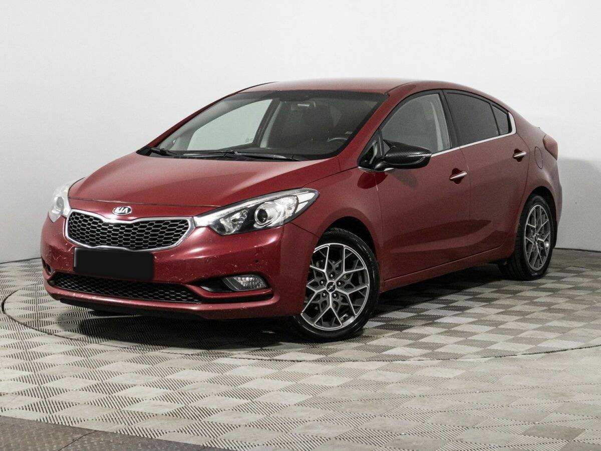 Kia Cerato 2014 года с пробегом. Посмотреть фото