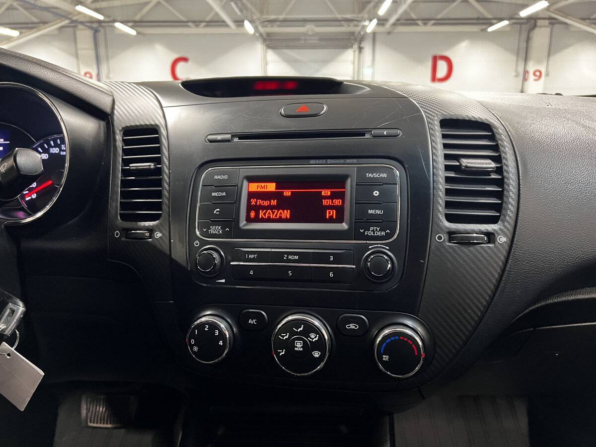 Kia Cerato 2014 года с пробегом. Фото: #14