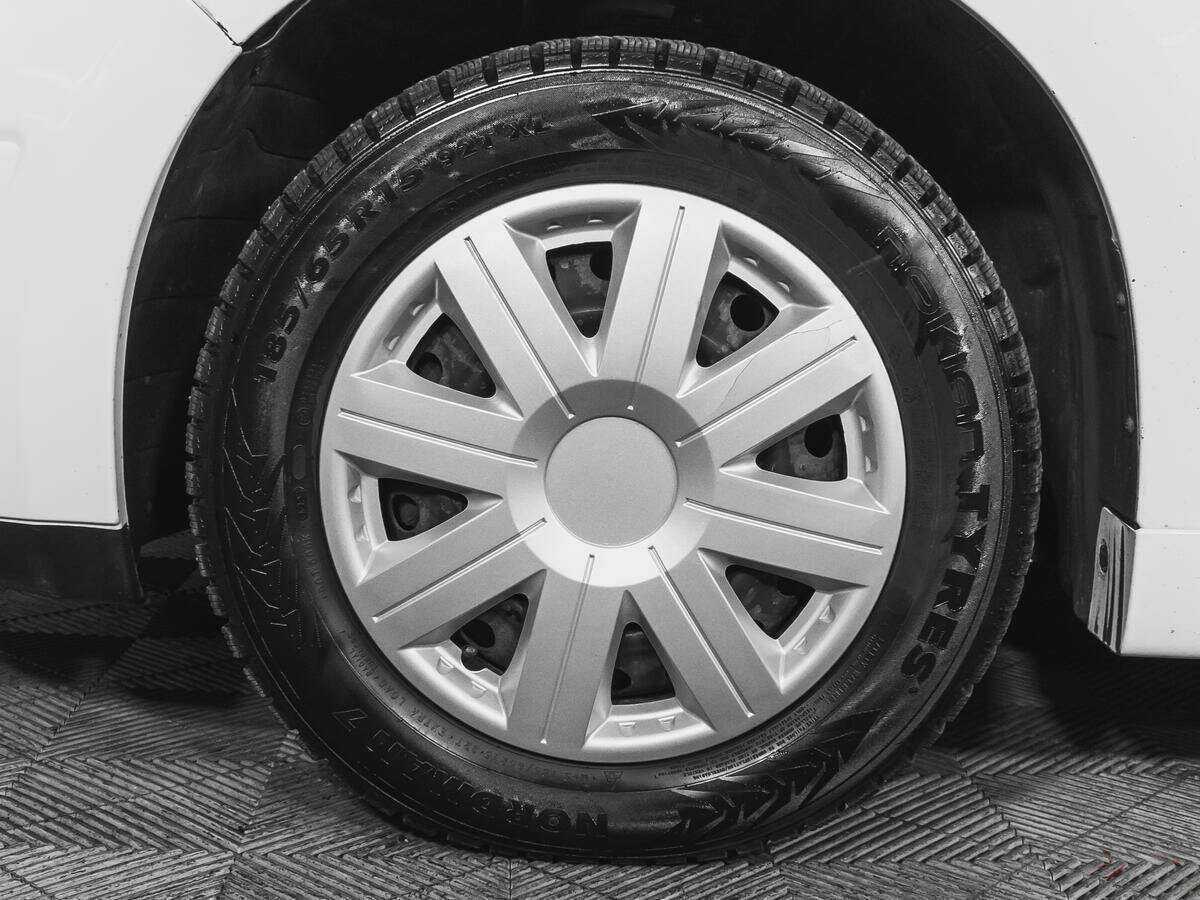 Nissan Tiida 2013 года с пробегом. Фото: #14