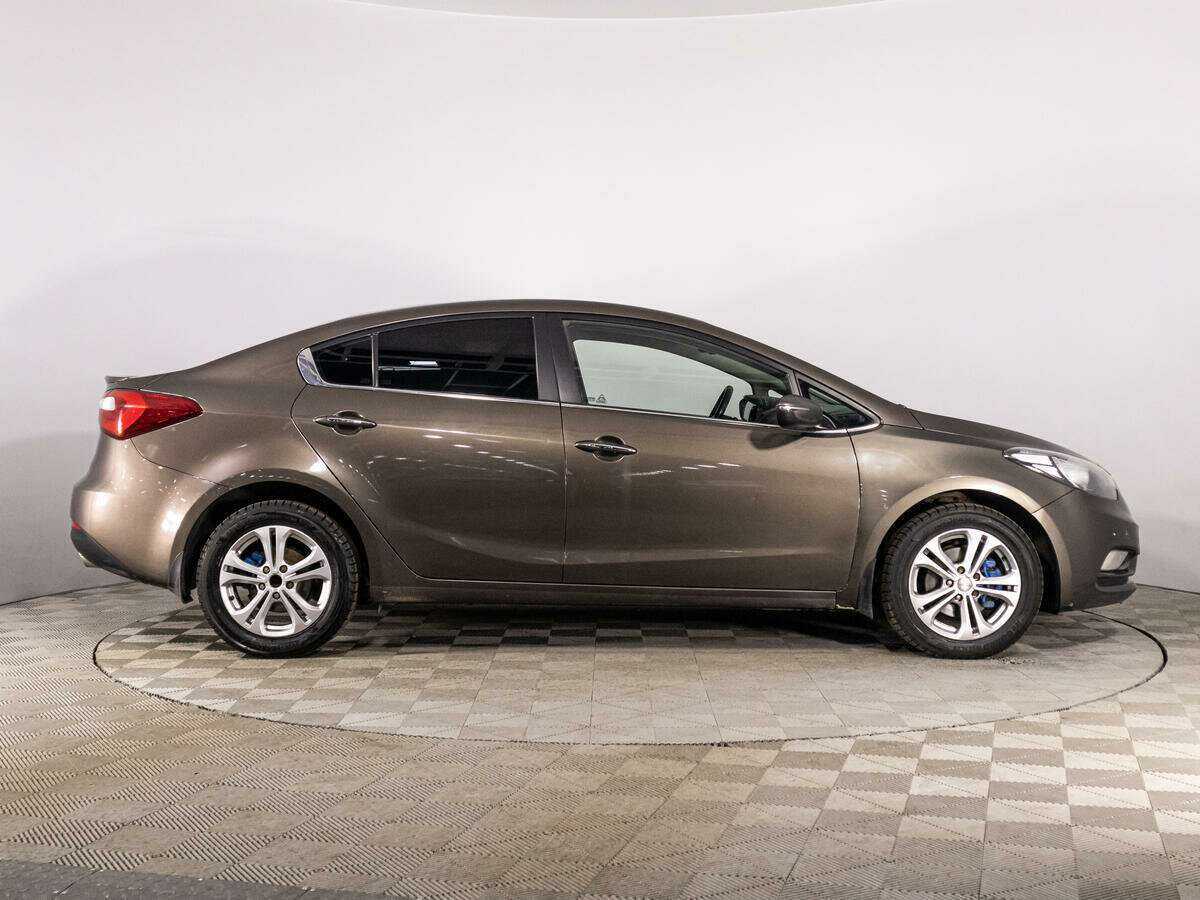 Kia Cerato 2014 года с пробегом. Фото: #3