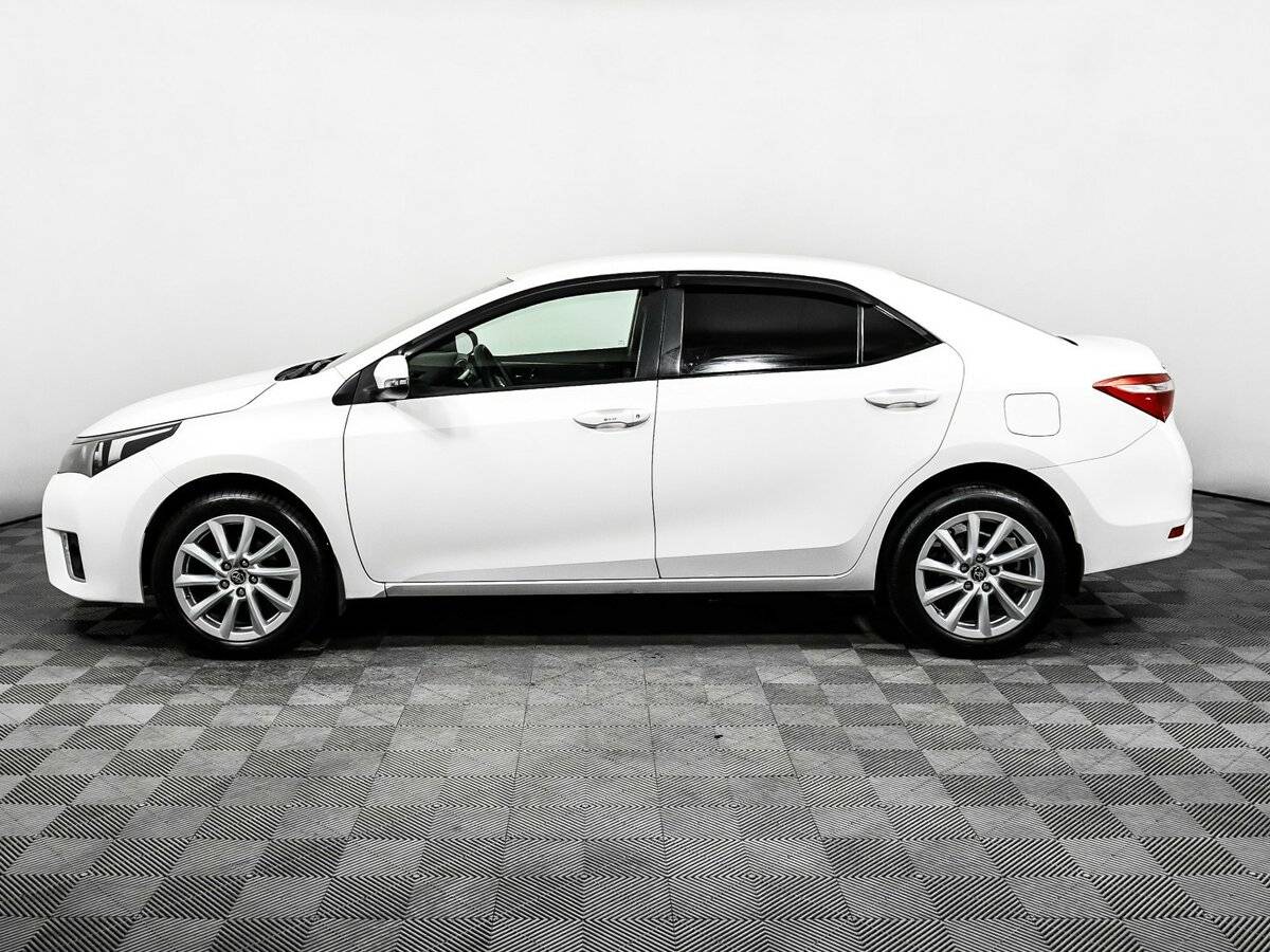 Toyota Corolla 2013 года с пробегом. Фото: #7