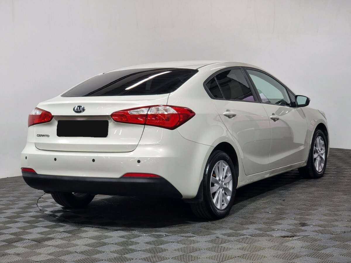 Kia Cerato 2014 года с пробегом. Фото: #2
