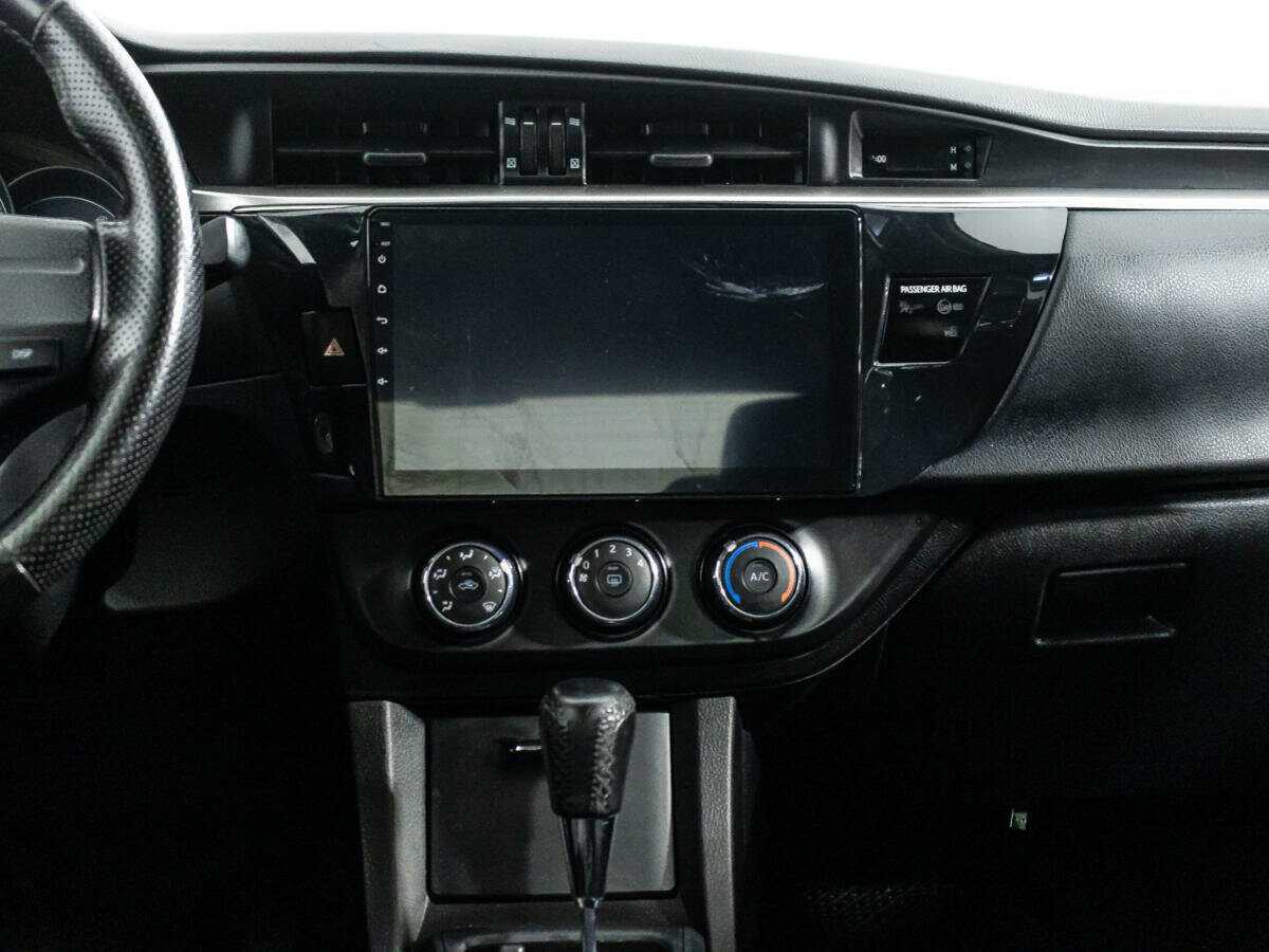 Toyota Corolla 2013 года с пробегом. Фото: #13