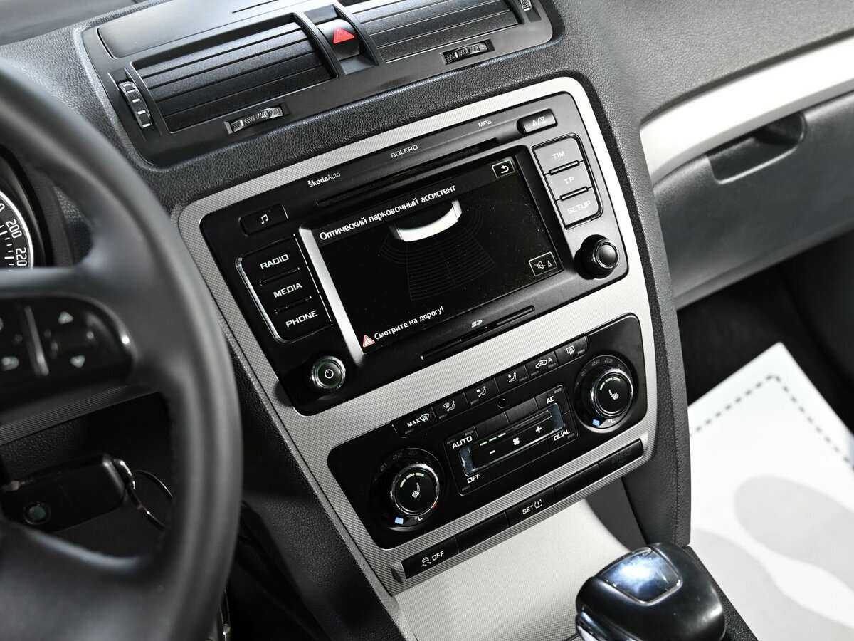 Skoda Octavia 2012 года с пробегом. Фото: #9