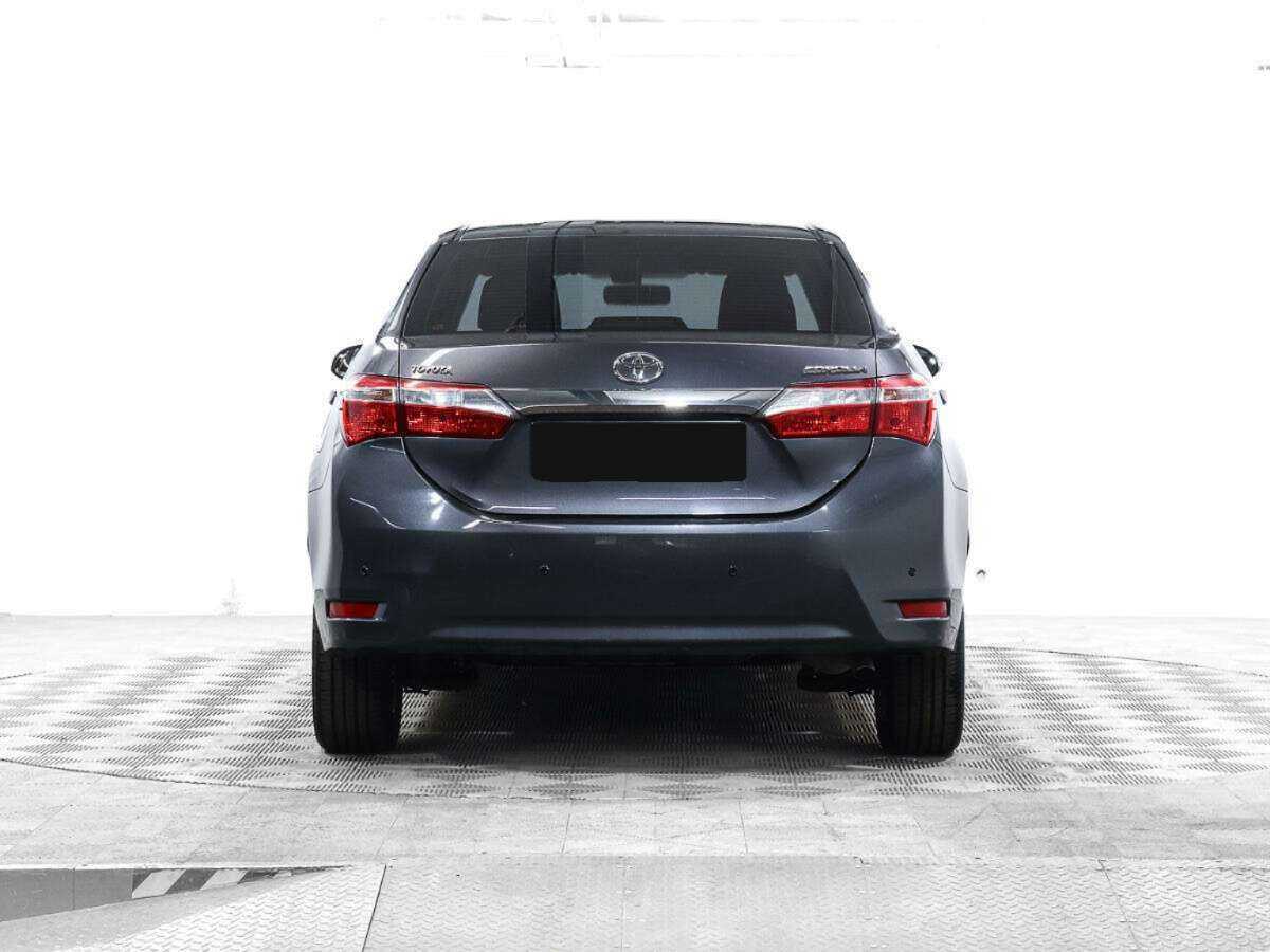 Toyota Corolla 2013 года с пробегом. Фото: #4