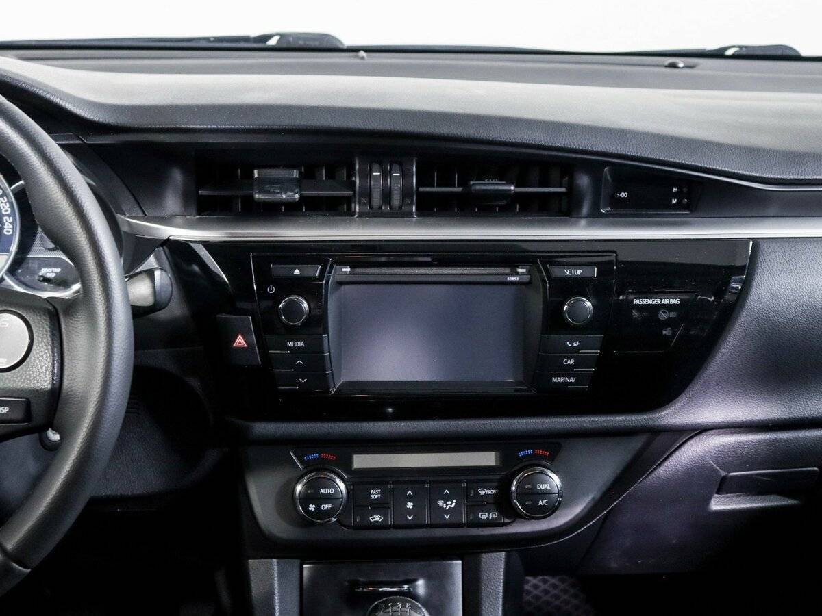 Toyota Corolla 2014 года с пробегом. Фото: #9