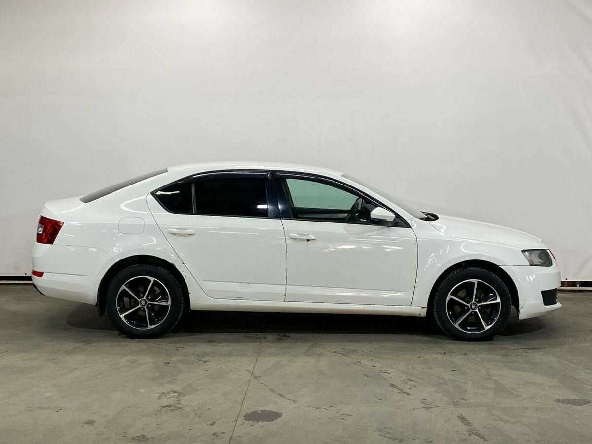 Skoda Octavia 2013 года с пробегом. Фото: #3