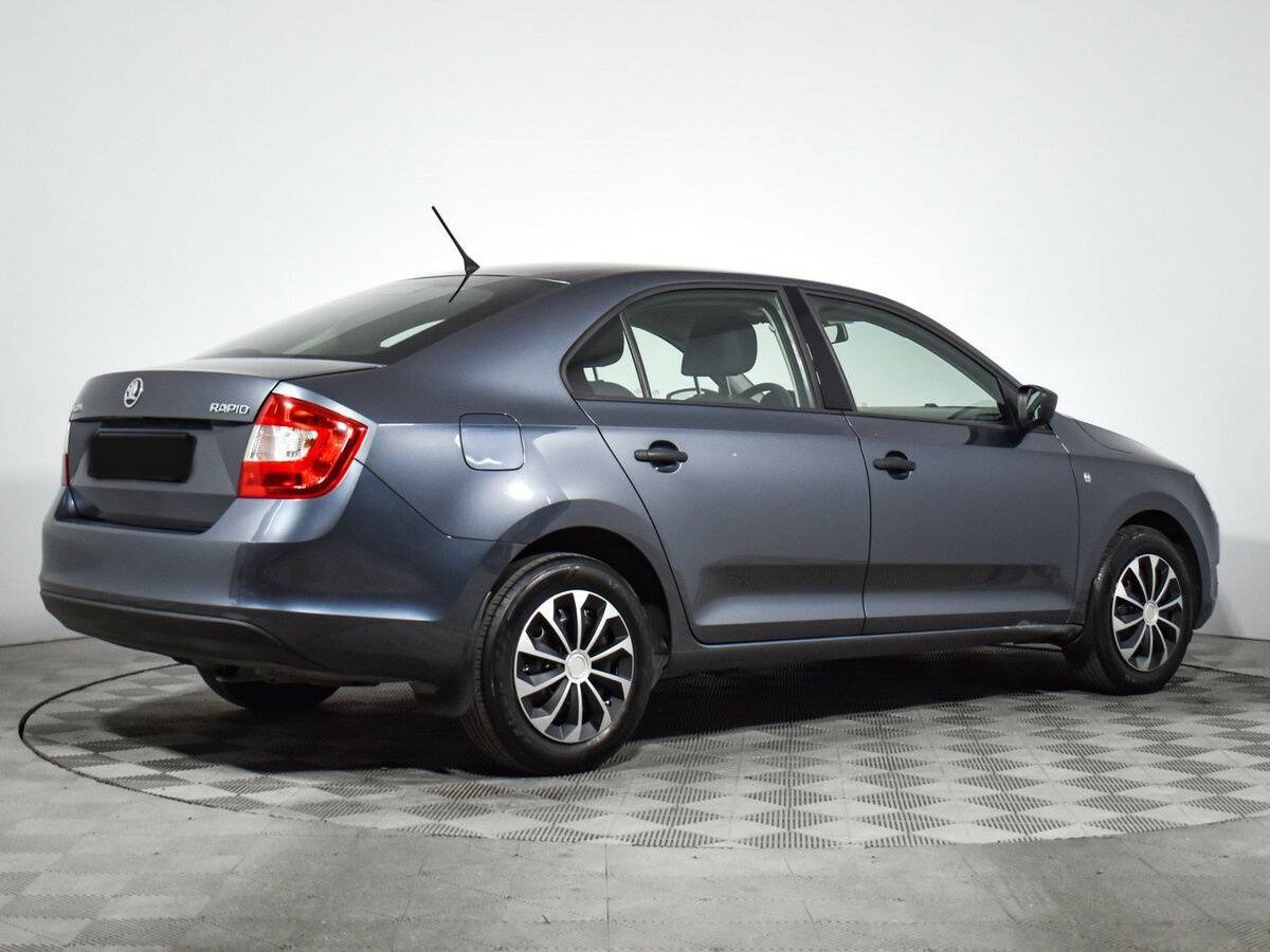 Skoda Rapid 2014 года с пробегом. Фото: #4