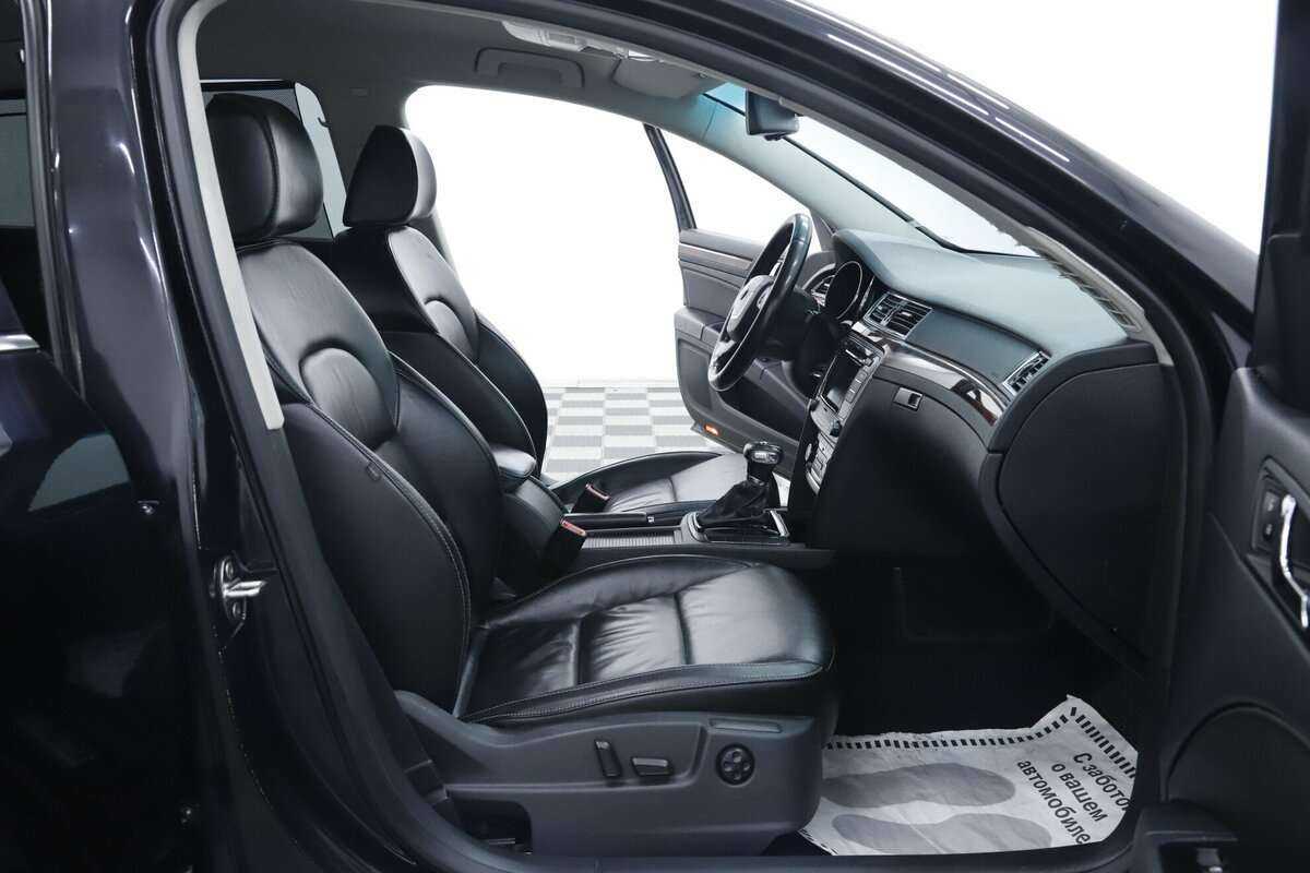 Skoda Superb 2013 года с пробегом. Фото: #16