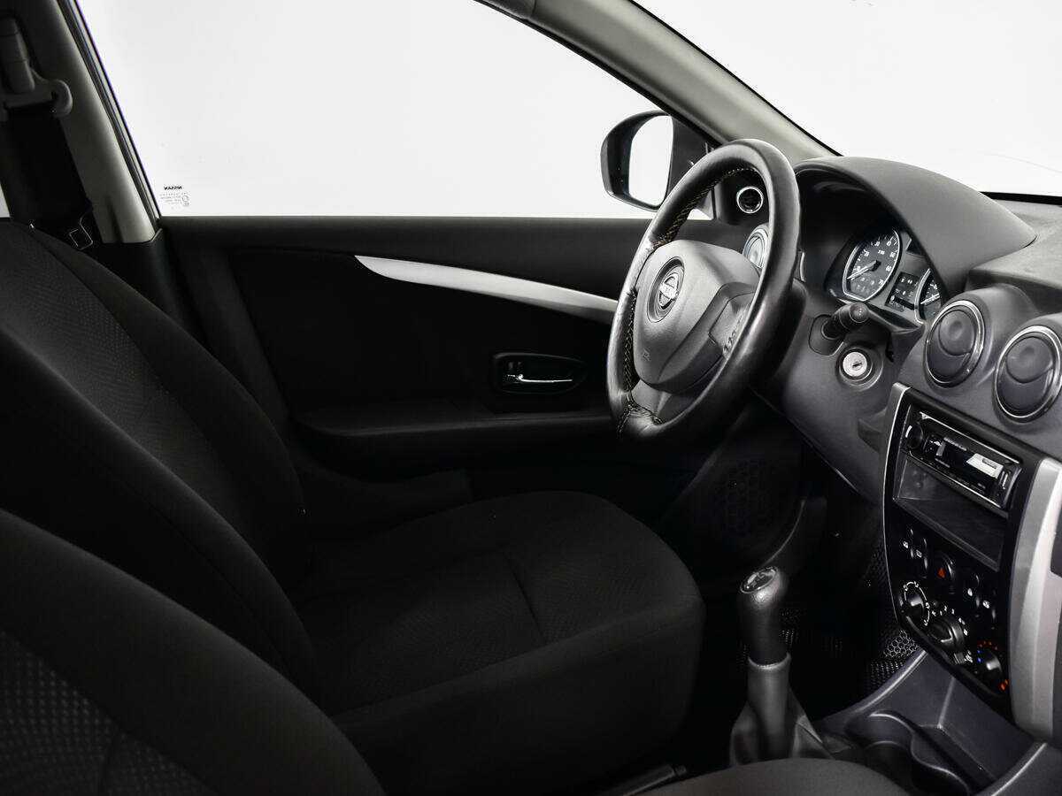 Nissan Almera 2013 года с пробегом. Фото: #8