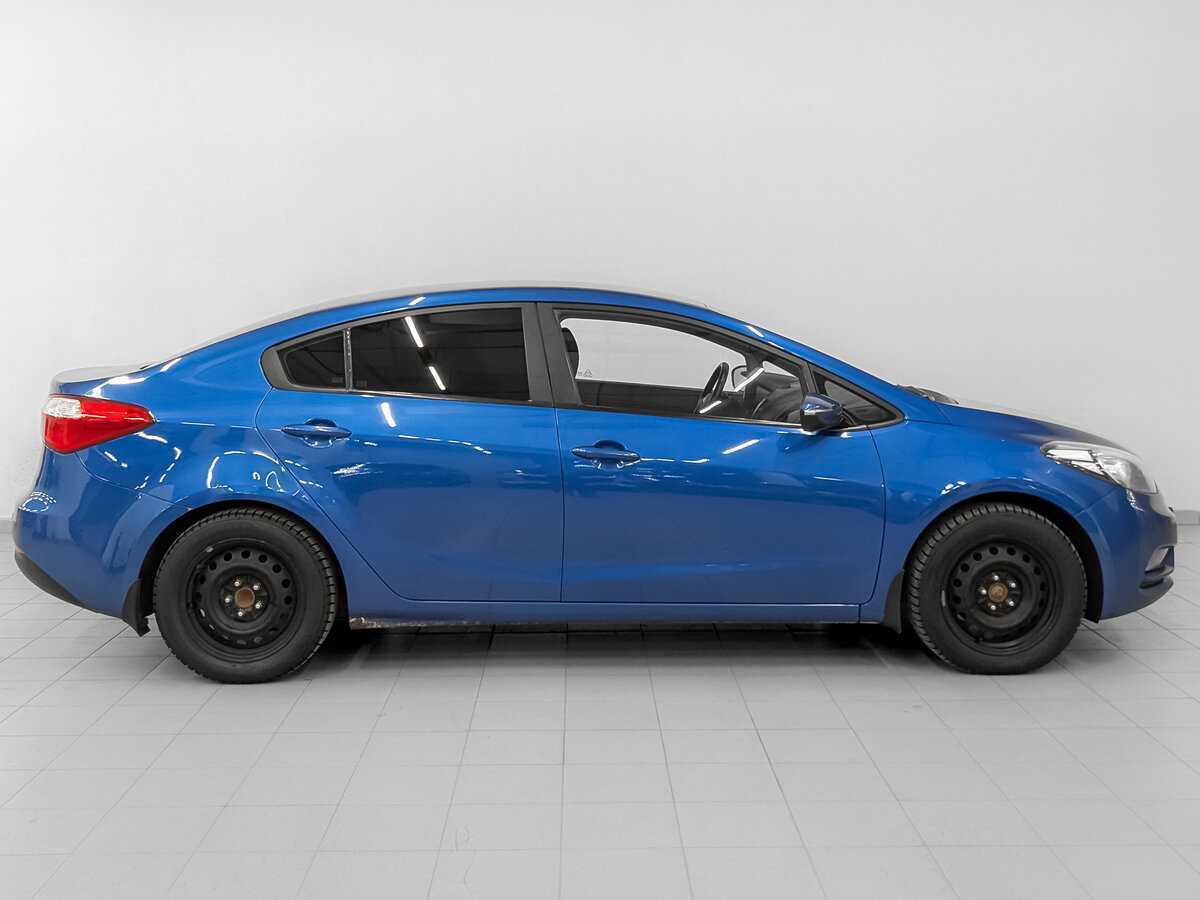 Kia Cerato 2013 года с пробегом. Фото: #3