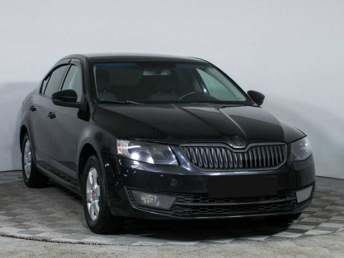 Skoda Octavia 2013 года с пробегом. Фото: #2