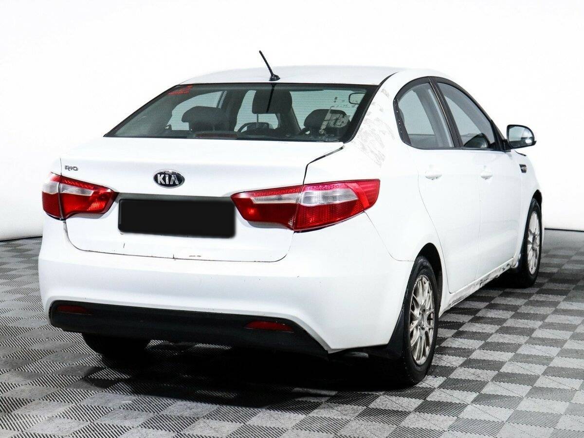 Kia Rio 2013 года с пробегом. Фото: #3