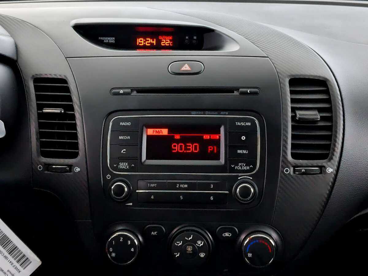 Kia Cerato 2015 года с пробегом. Фото: #12