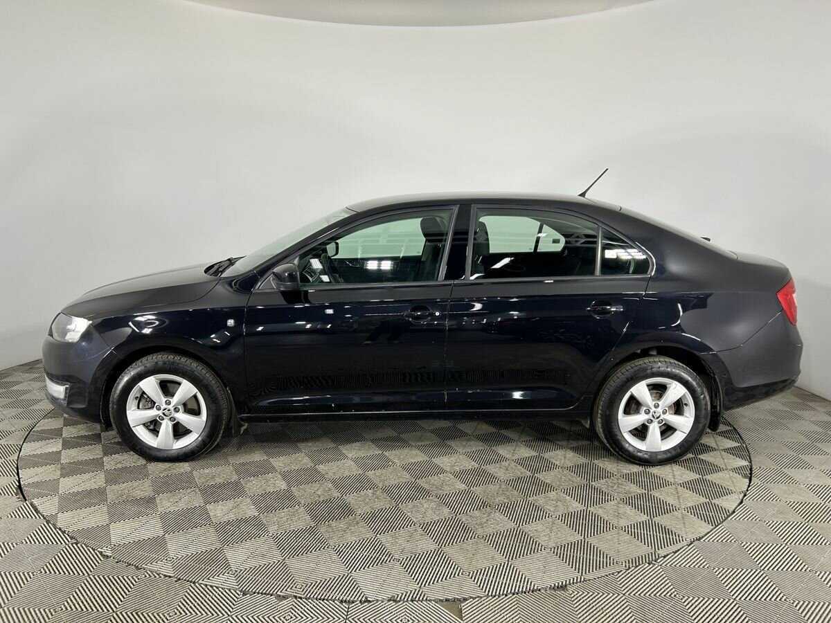 Skoda Rapid 2014 года с пробегом. Фото: #4