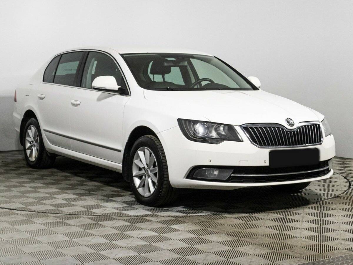 Skoda Superb 2013 года с пробегом. Фото: #2