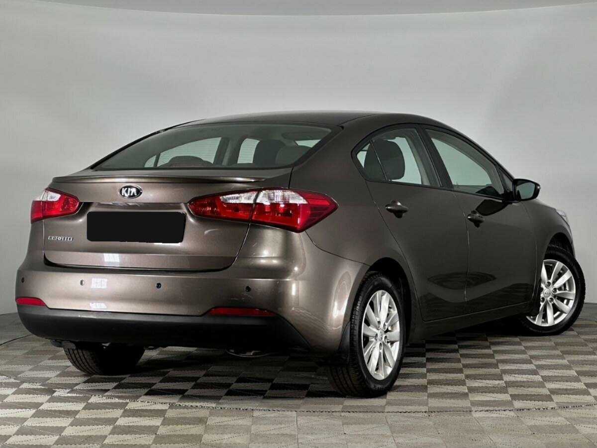 Kia Cerato 2014 года с пробегом. Фото: #1