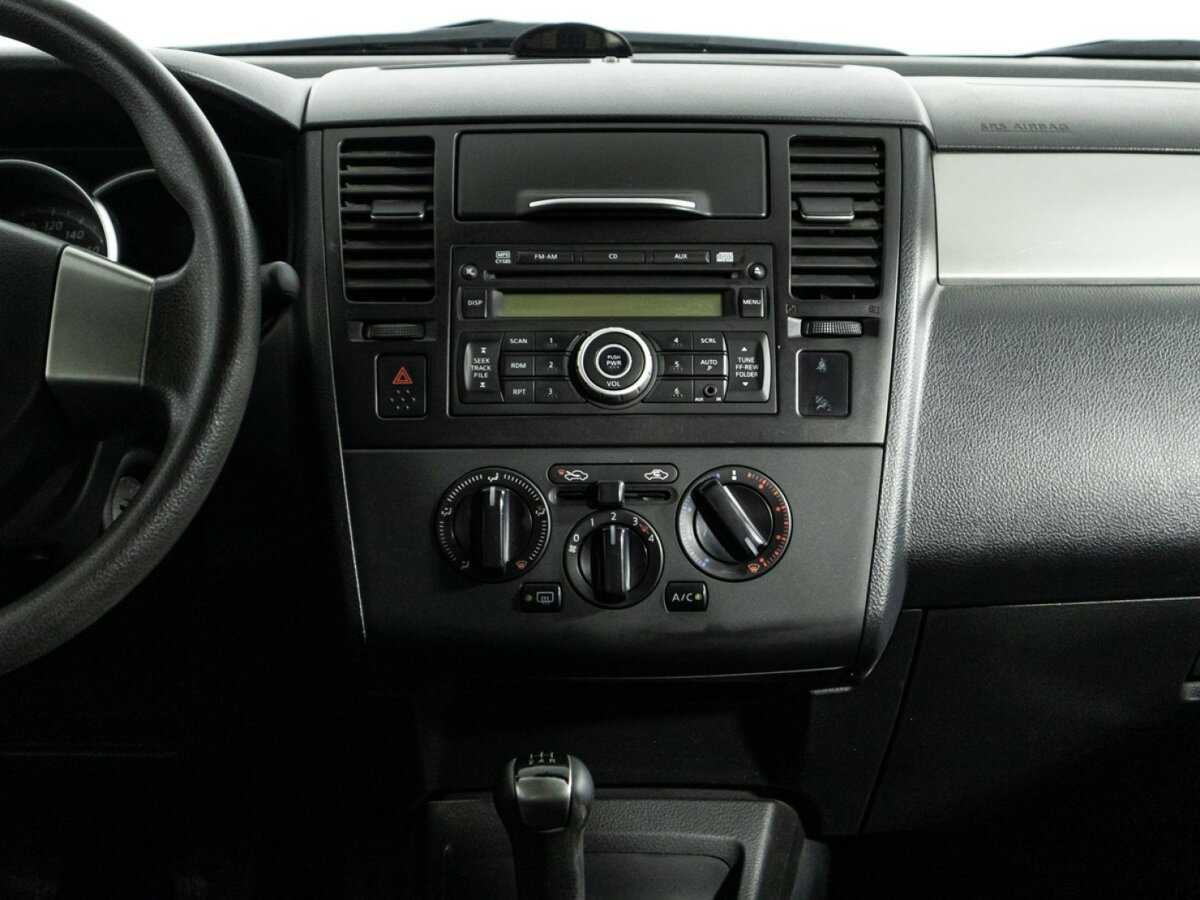 Nissan Tiida 2013 года с пробегом. Фото: #13