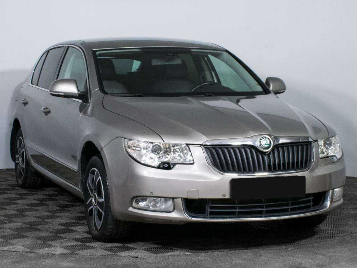 Skoda Superb 2013 года с пробегом. Фото: #2