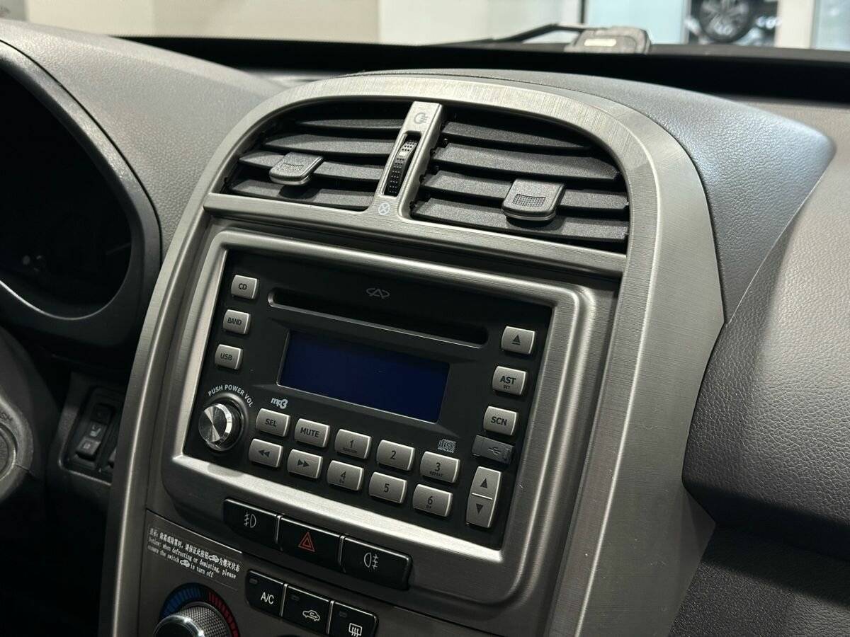 Chery Tiggo (T11) 2015 года с пробегом. Фото: #11