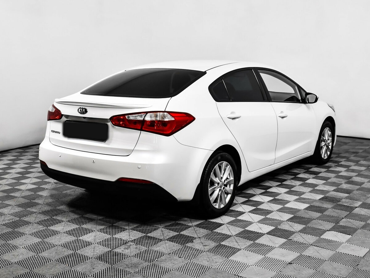 Kia Cerato 2013 года с пробегом. Фото: #4