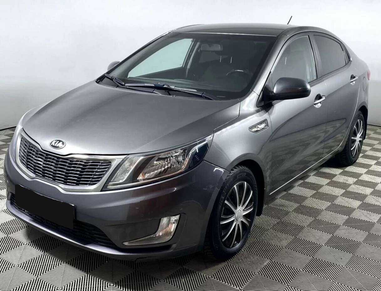 Kia Rio 2013 года с пробегом. Посмотреть фото