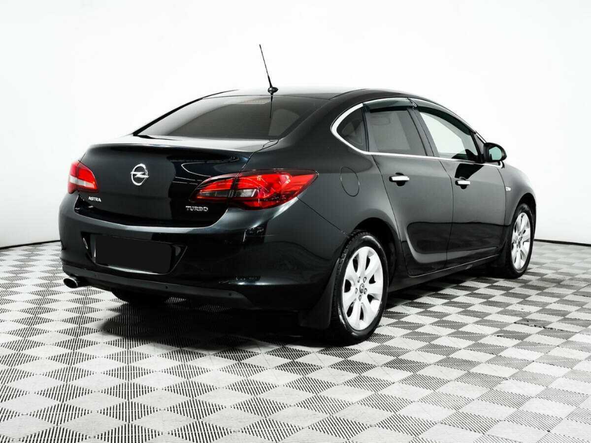 Opel Astra 2013 года с пробегом. Фото: #4