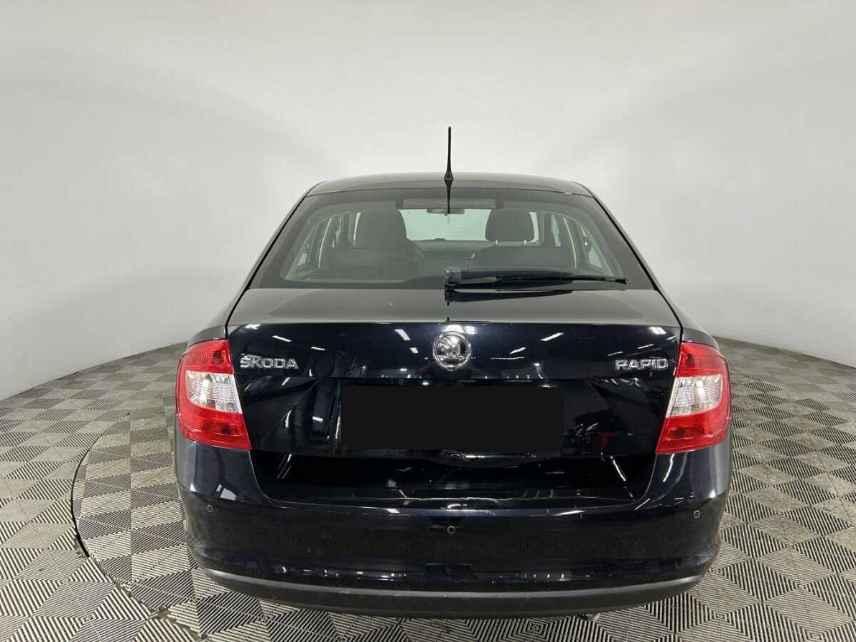 Skoda Rapid 2014 года с пробегом. Фото: #2