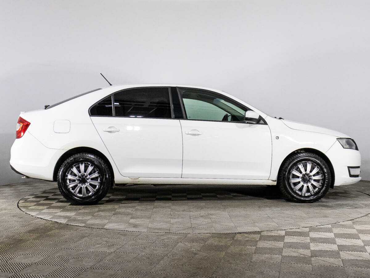 Skoda Rapid 2014 года с пробегом. Фото: #1
