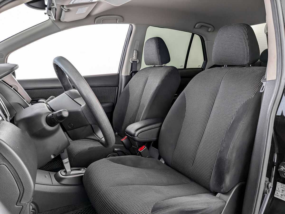 Nissan Tiida 2013 года с пробегом. Фото: #15