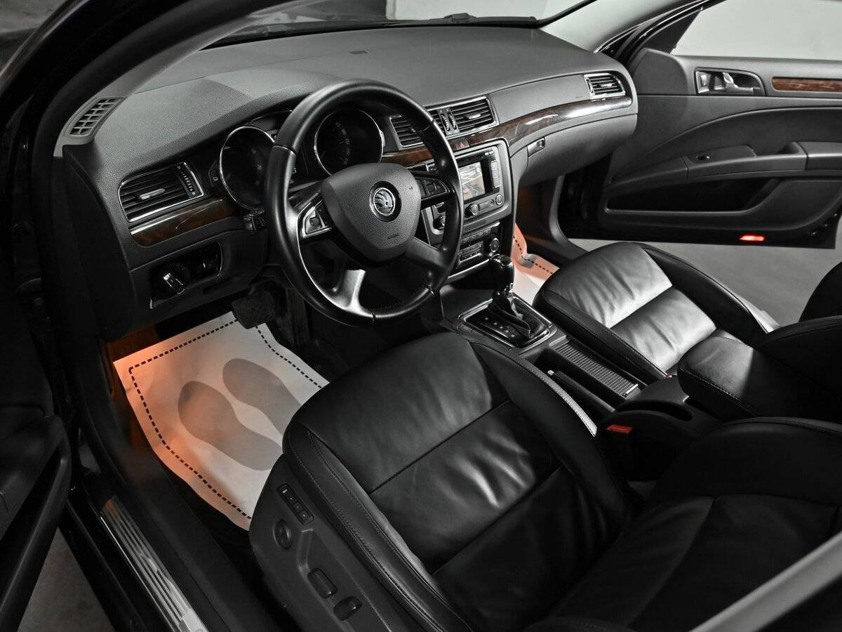 Skoda Superb 2013 года с пробегом. Фото: #7