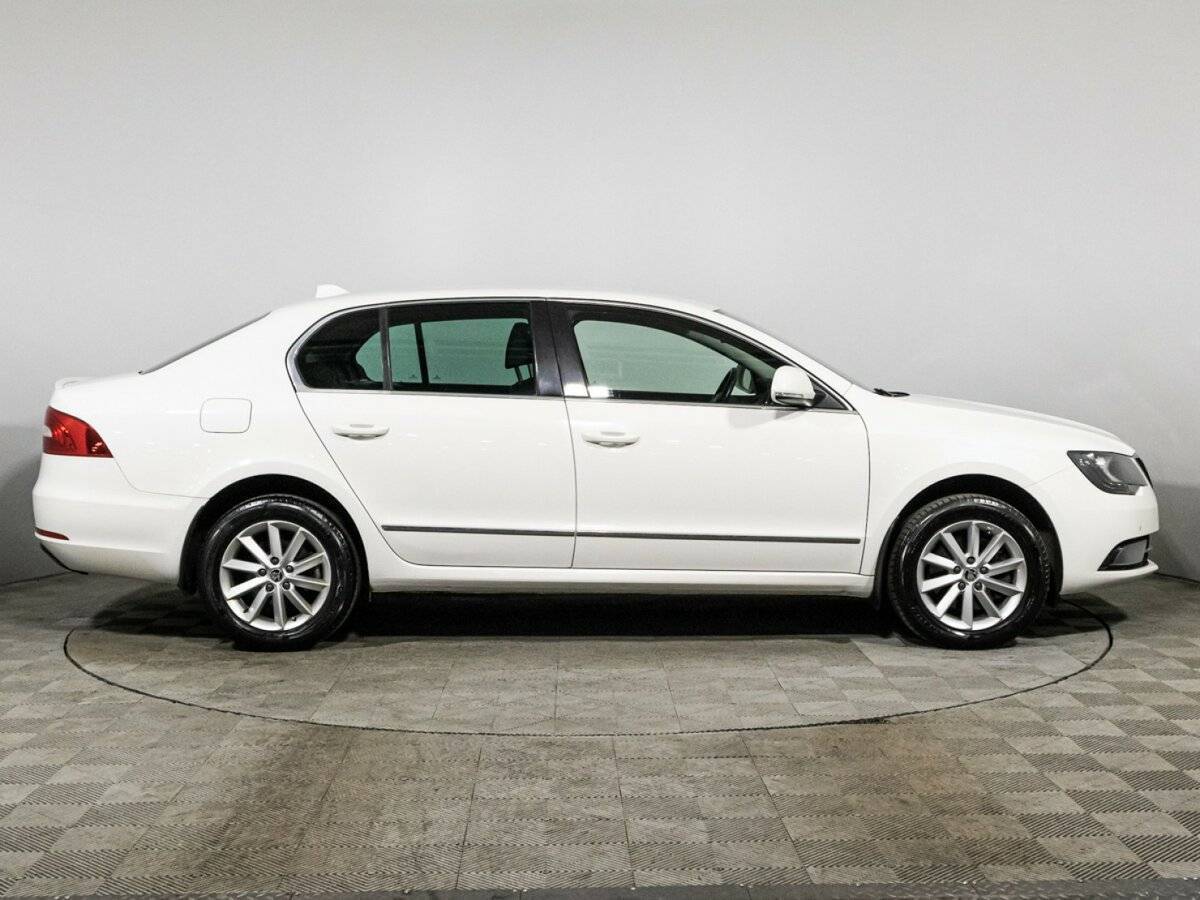 Skoda Superb 2013 года с пробегом. Фото: #3