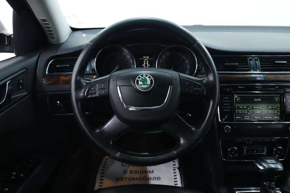 Skoda Superb 2013 года с пробегом. Фото: #11