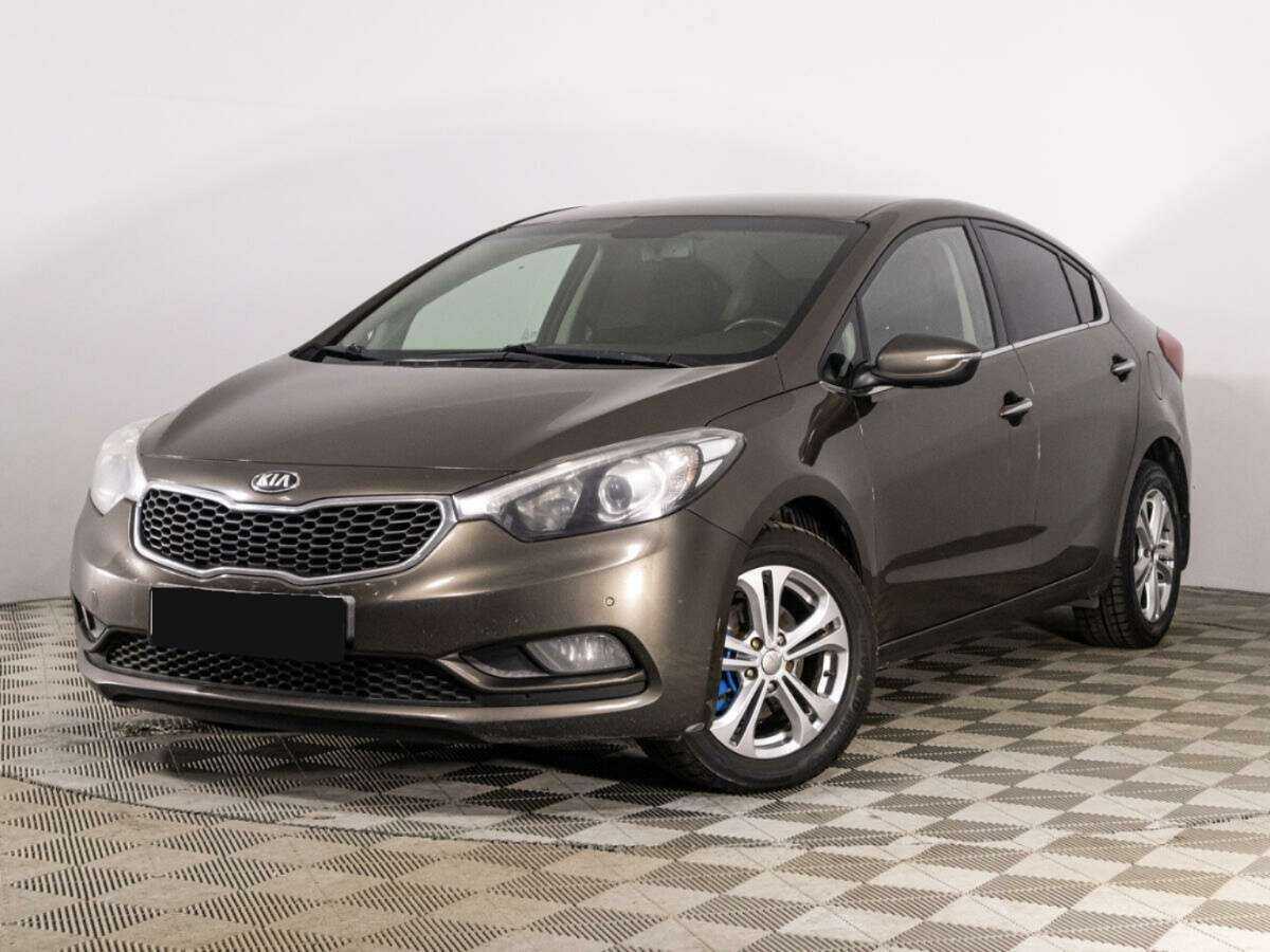 Kia Cerato 2014 года с пробегом. Посмотреть фото
