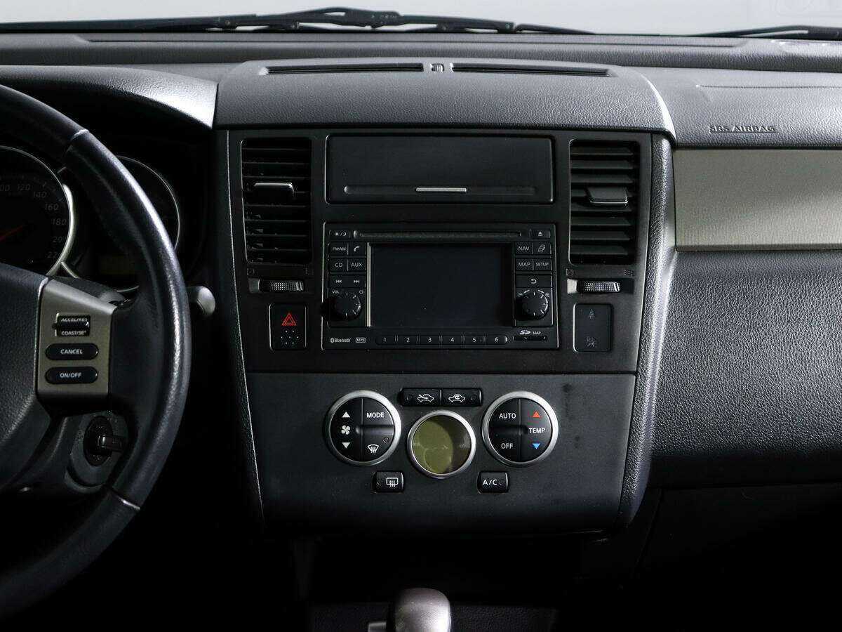 Nissan Tiida 2012 года с пробегом. Фото: #12