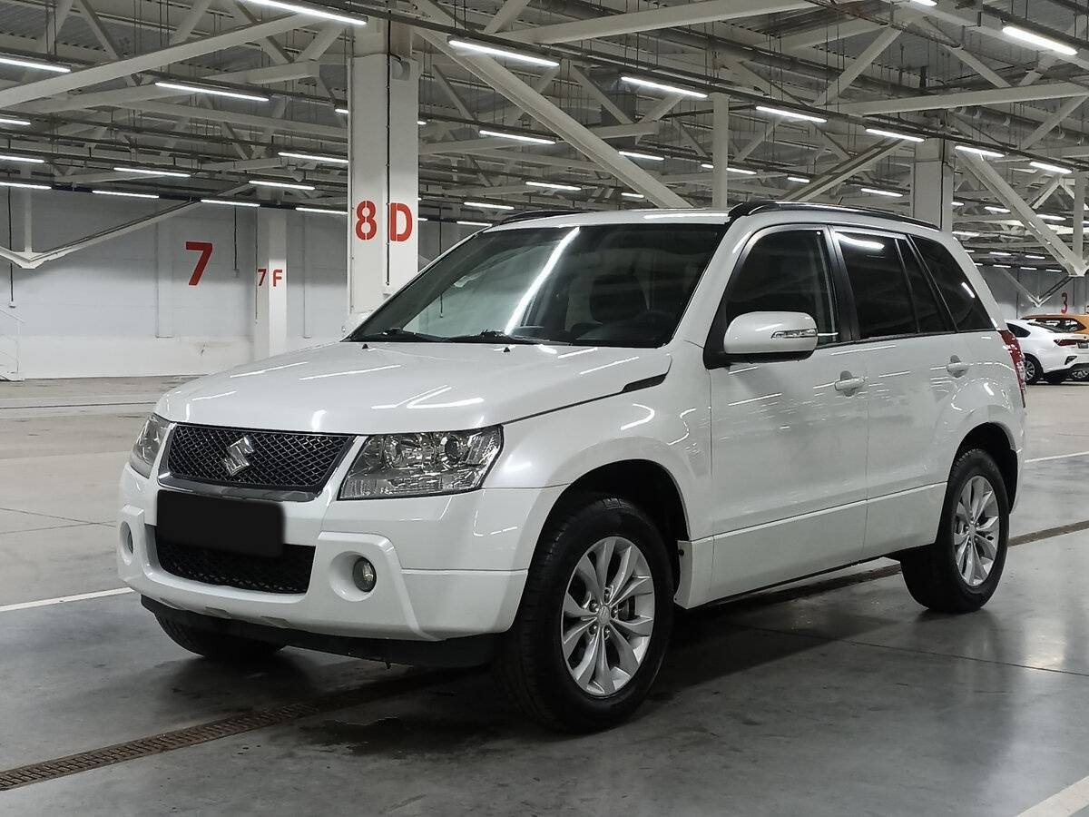 Suzuki Grand Vitara 2013 года с пробегом. Посмотреть фото