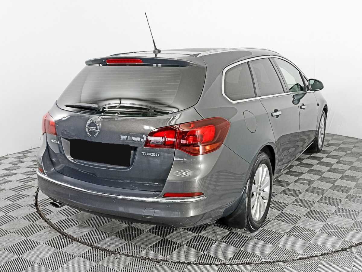 Opel Astra 2013 года с пробегом. Фото: #4