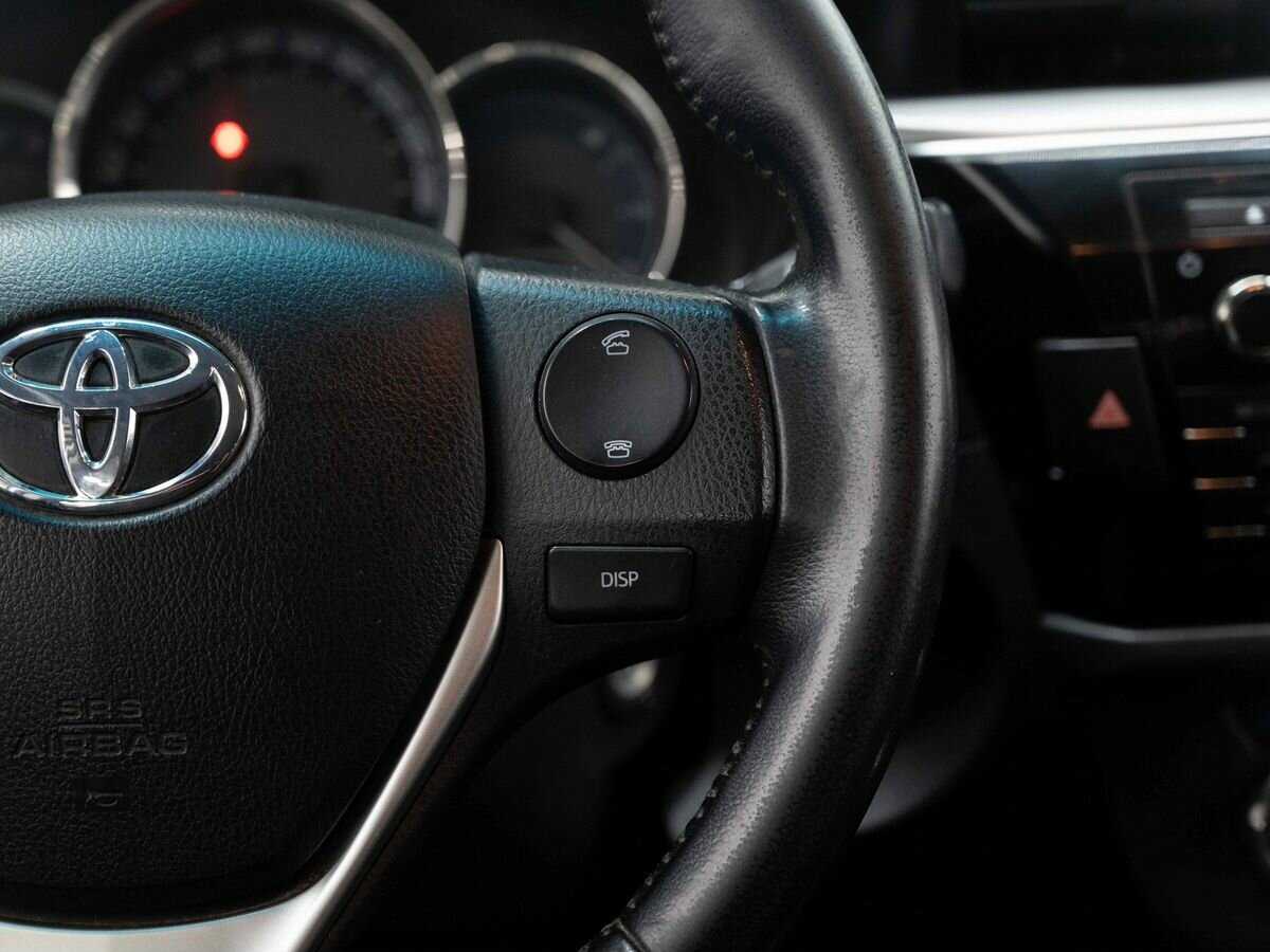 Toyota Corolla 2013 года с пробегом. Фото: #17